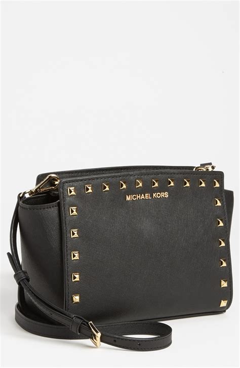 michael kors black crossbody with gold studs|Michael Kors Crossbody backpack.